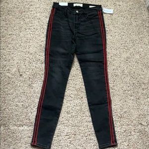 Black PacSun jeans w/ red stripes